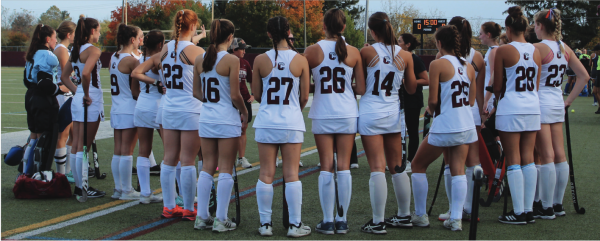 Team talks: The girls’ varsity field hockey team huddles together before the second half of the Oct. 27 game against Great Valley High School. They won the Central League and claimed the No. 13 spot in the country.